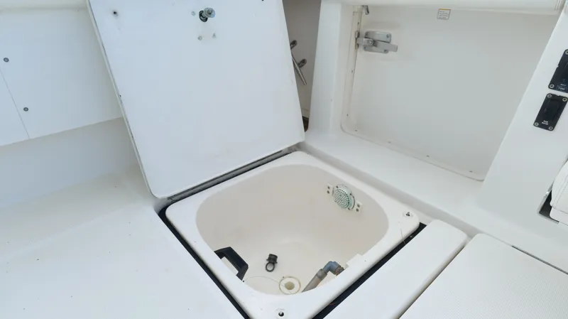 Slide: The Image of Open storage compartment on a 2000 Tiara Yachts 3700 Open boat. - 17