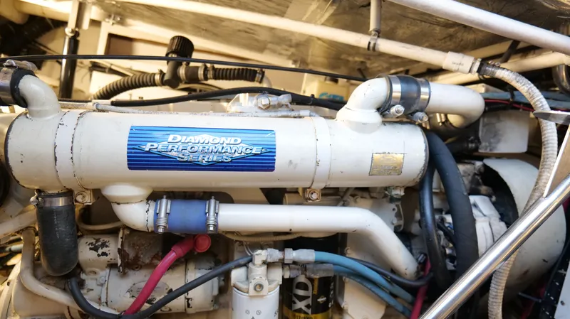 Slide: The Image of Engine compartment of a 2000 Tiara Yachts 3700 Open, featuring Diamond Performance Series components. - 47