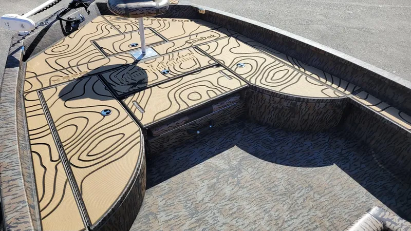 Slide: The Image of Interior of 2026 Xpress X23B Bay boat with custom Seadek flooring design. - 9