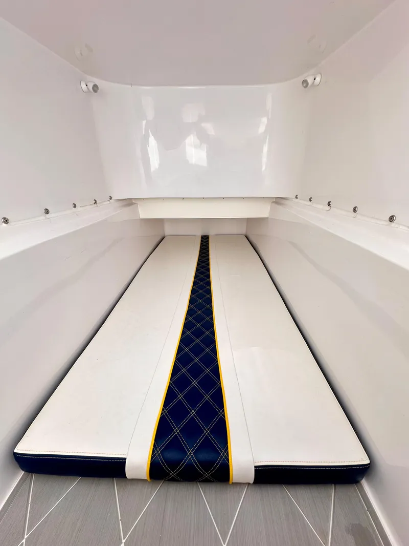 Slide: The Image of 2022 Midnight Express 37 Open boat cockpit with modern navigation system and stylish seating. - 12