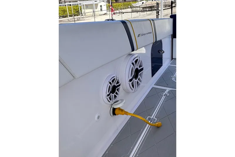 Slide: The Image of 2022 Midnight Express 37 Open boat interior with speakers and power cable. - 17