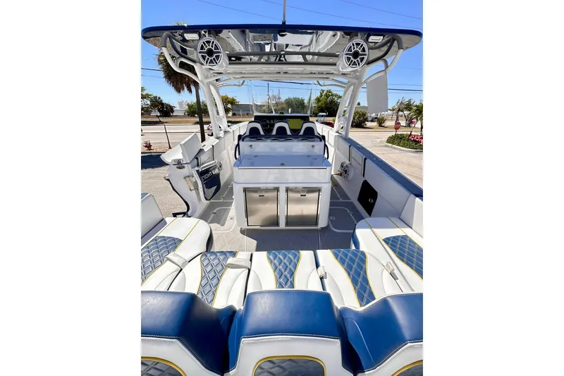 Slide: The Image of 2022 Midnight Express 37 Open boat interior with luxurious seating and modern amenities. - 20