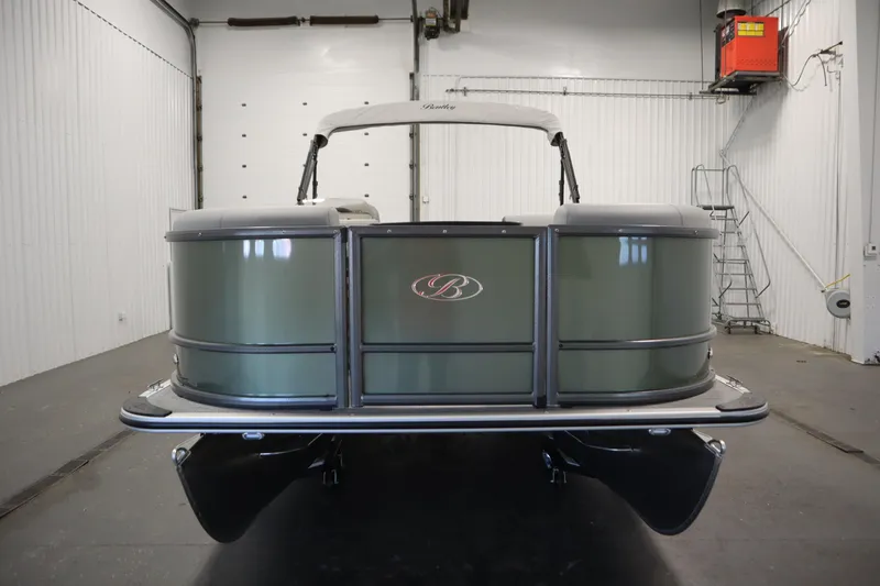 Slide: The Image of 2025 Bentley Pontoons 180 CRUISE LE in a showroom, front view. - 1