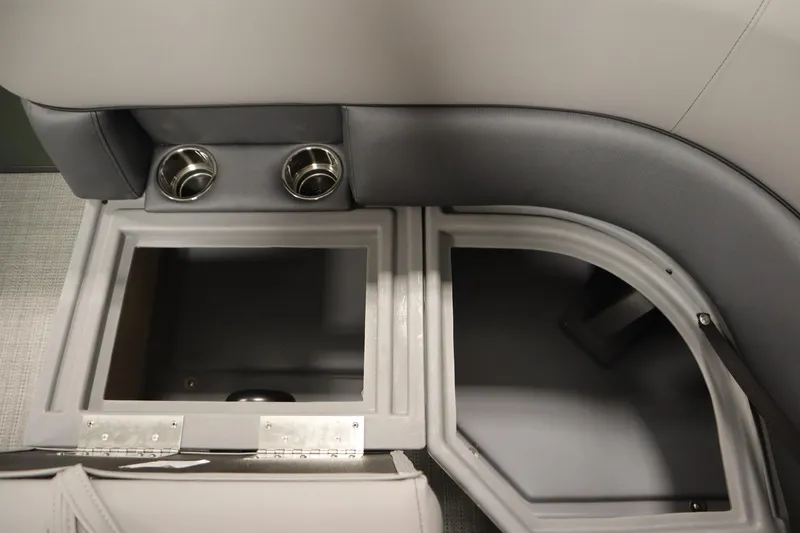 Slide: The Image of 2025 Bentley Pontoons 180 CRUISE LE interior storage compartments and cup holders. - 12