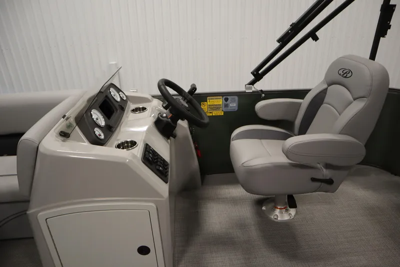 Slide: The Image of 2025 Bentley Pontoons 180 CRUISE LE helm with steering wheel and captain's chair. - 16