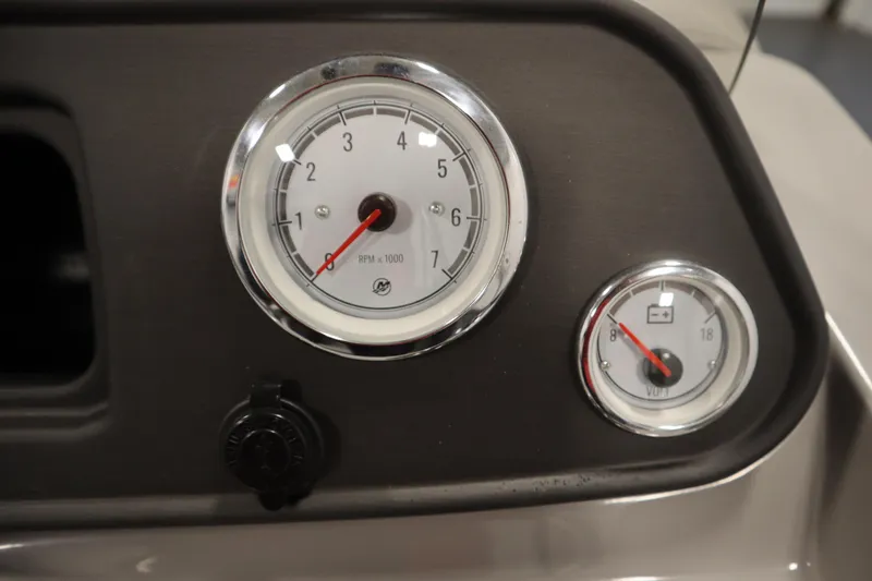 Slide: The Image of Dashboard gauges of 2025 Bentley Pontoons 180 CRUISE LE, showing RPM and voltage. - 22