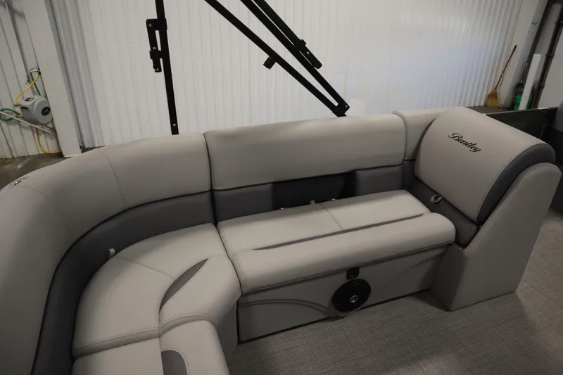 Slide: The Image of 2025 Bentley Pontoons 180 CRUISE LE interior with luxurious gray seating and sleek design. - 28