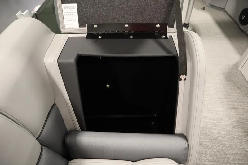 Slide: The Image of 2025 Bentley Pontoons 180 CRUISE LE storage compartment with open lid, showcasing interior space. - 29