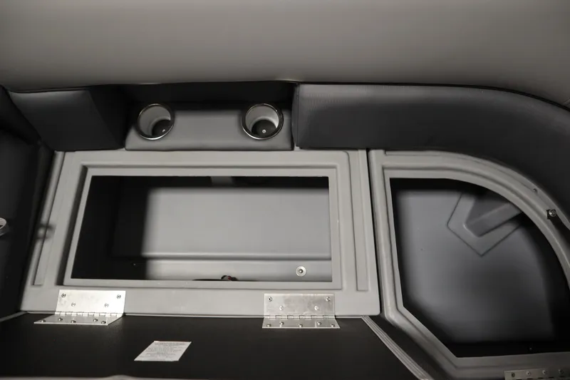 Slide: The Image of Interior storage compartment of 2025 Bentley Pontoons 220 Cruise XL with cup holders. - 10