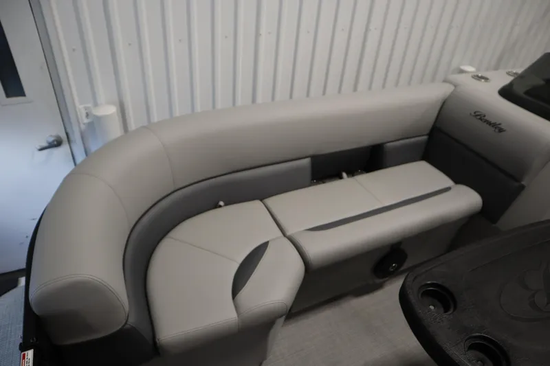 Slide: The Image of 2025 Bentley Pontoons 220 Cruise XL interior seating, featuring luxurious gray upholstery. - 11
