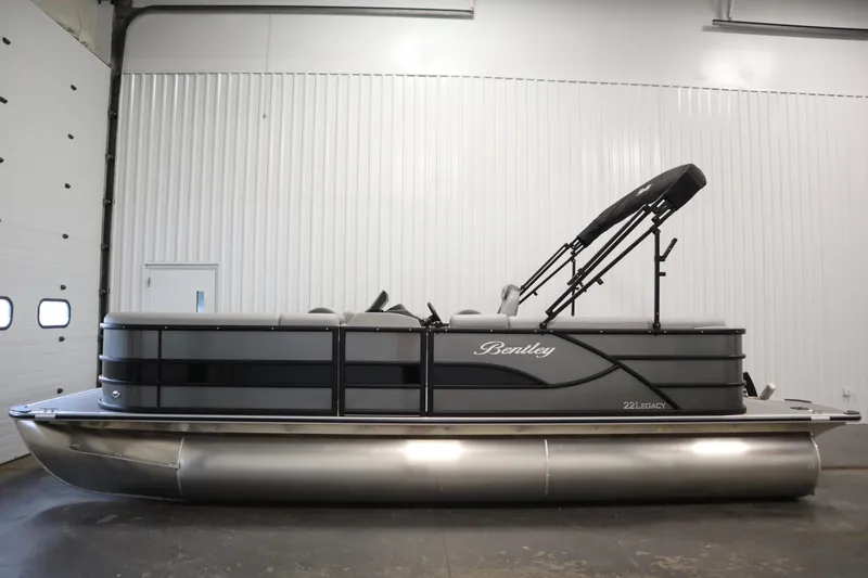 Slide: The Image of 2025 Bentley Pontoons 220 Cruise XL in a showroom, side view. - 4