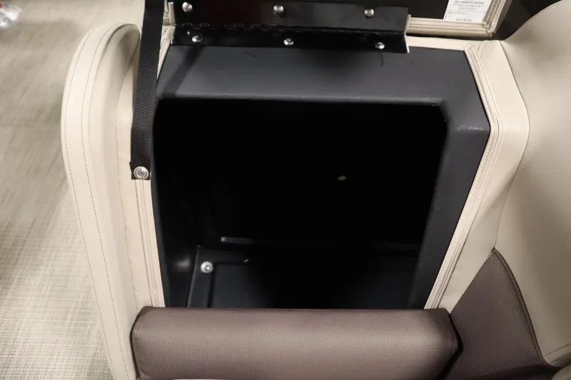 Slide: The Image of 2026 Bentley Pontoons 220 Navigator storage compartment with beige and brown upholstery. - 12