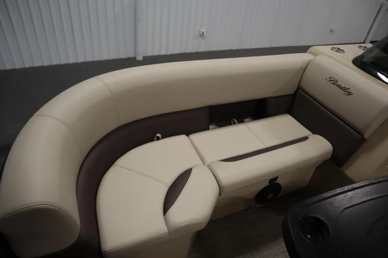 Slide: The Image of Luxurious seating on 2026 Bentley Pontoons 220 Navigator, featuring elegant beige and brown upholstery. - 14