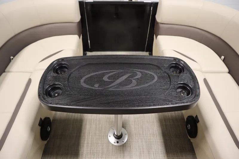 Slide: The Image of 2026 Bentley Pontoons 220 Navigator interior with elegant seating and stylish table design. - 16