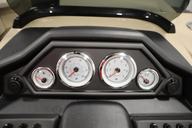 Slide: The Image of Dashboard of 2026 Bentley Pontoons 220 Navigator with gauges and controls. - 21