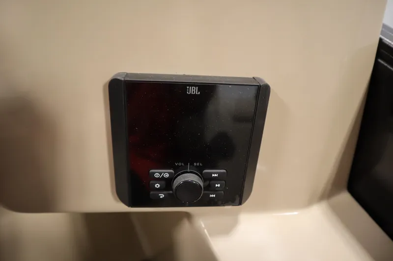Slide: The Image of JBL audio control panel on 2026 Bentley Pontoons 220 Navigator boat. - 24