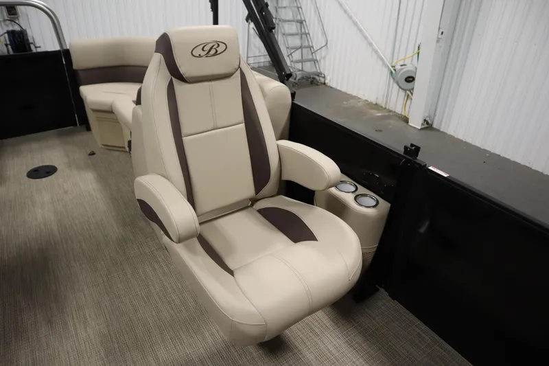 Slide: The Image of Luxurious seating in 2026 Bentley Pontoons 220 Navigator boat, featuring beige and brown upholstery. - 27