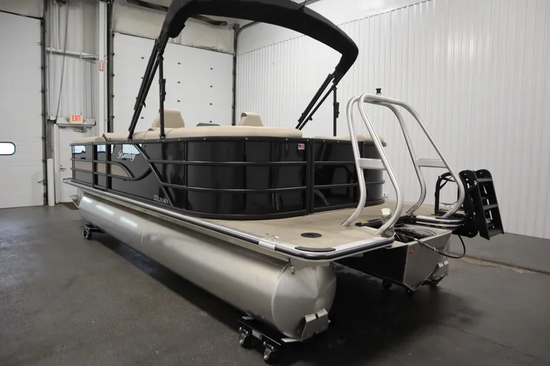 Slide: The Image of 2026 Bentley Pontoons 220 Navigator in showroom, featuring sleek design and modern amenities. - 6