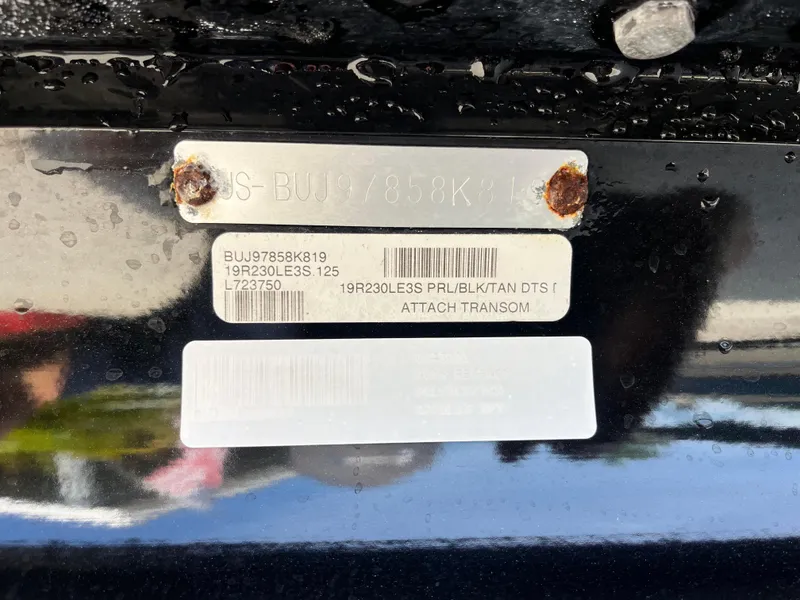 Slide: The Image of Close-up of a 2019 Regency 230 LE3 boat identification plate with serial numbers. - 20