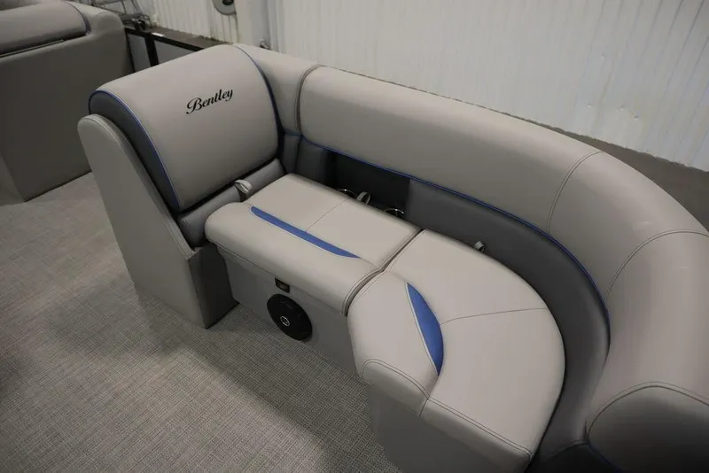 Slide: The Image of 2025 Bentley Pontoons 223 Bolt Tri-Toon interior seating with elegant gray and blue upholstery. - 10