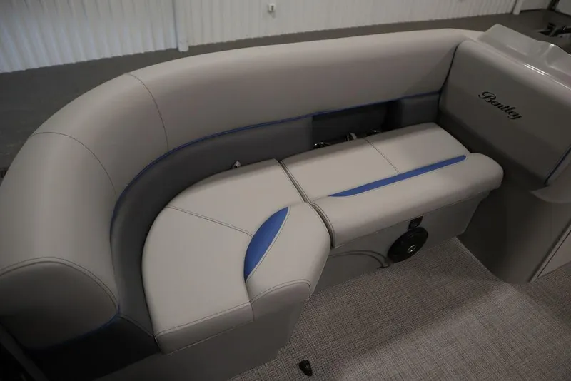 Slide: The Image of 2025 Bentley Pontoons 223 Bolt Tri-Toon interior seating with gray and blue accents. - 13