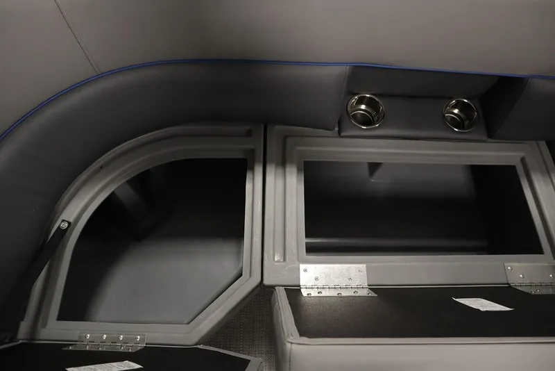 Slide: The Image of Interior of 2025 Bentley Pontoons 223 Bolt Tri-Toon with storage compartments and cup holders. - 16