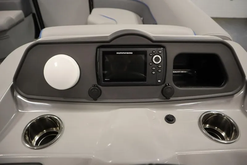 Slide: The Image of Dashboard of 2025 Bentley Pontoons 223 Bolt Tri-Toon with Humminbird display and cup holders. - 21