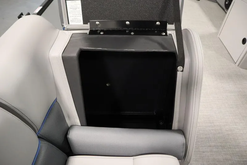 Slide: The Image of 2025 Bentley Pontoons 223 Bolt Tri-Toon seat storage compartment, open and empty. - 27