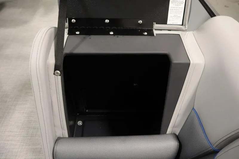 Slide: The Image of 2025 Bentley Pontoons 223 Bolt Tri-Toon storage compartment with gray upholstery and black interior. - 7