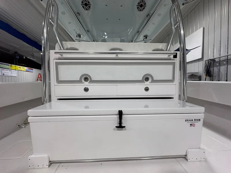 Slide: The Image of 2024 Contender 44 ST boat interior with storage compartments and stainless steel railings. - 21