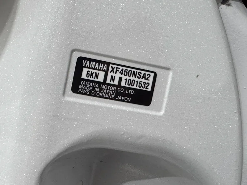 Slide: The Image of Label on Yamaha motor, model XF450NSA2, made in Japan, on Contender 44 ST 2024. - 5