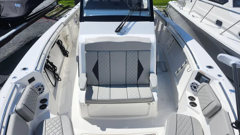 Slide: The Image of 2023 Pursuit S 358 Sport boat interior with luxurious seating and modern design. - 21