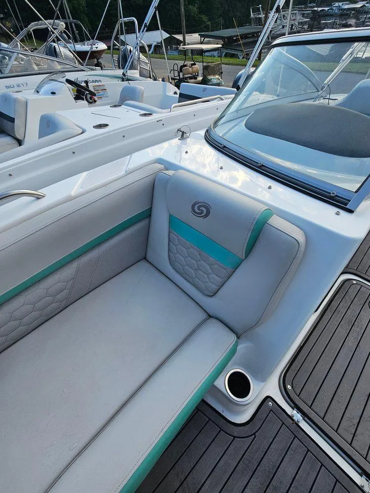 Slide: The Image of 2024 Hurricane SD 191 OB boat interior with cushioned seating and sleek design. - 3
