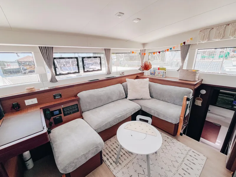 Slide: The Image of Luxurious interior of 2023 Lagoon 40 catamaran with cozy seating and modern decor. - 20