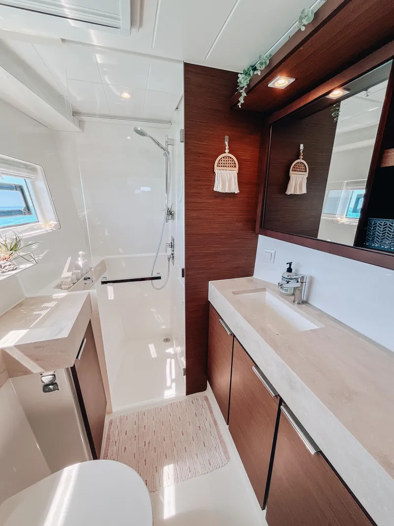 Slide: The Image of Luxurious bathroom in 2023 Lagoon 40 yacht with modern fixtures and elegant design. - 30