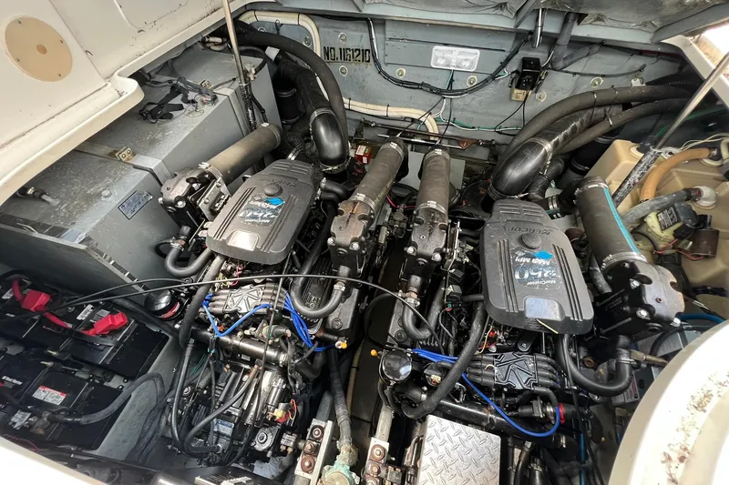 Slide: The Image of Engine compartment of a 2003 Sea Ray 320 Sundancer with twin MerCruiser engines. - 39