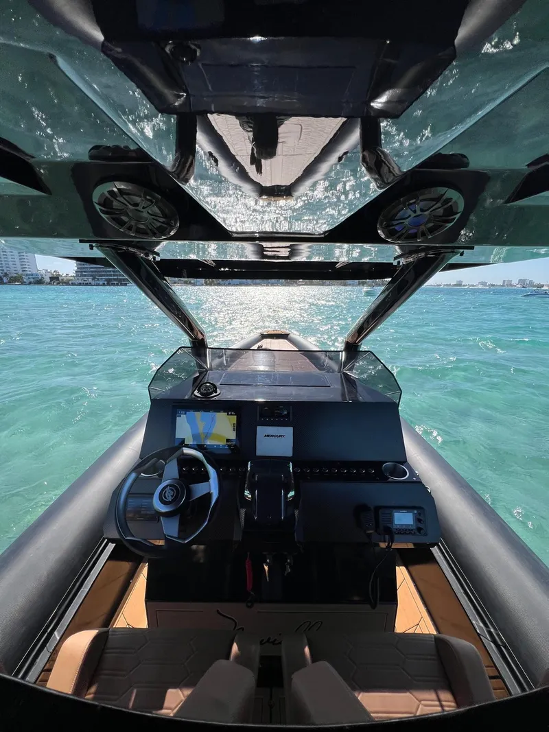 Slide: The Image of Interior view of 2026 Novielli Veloche 349 boat cockpit with ocean backdrop. - 7