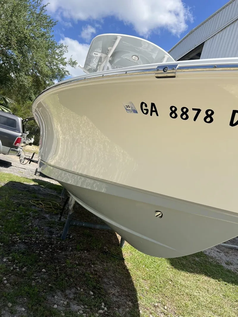 Slide: The Image of 2023 Sea Hunt BX Series BX 25 BR boat on trailer, side view, sunny day. - 7
