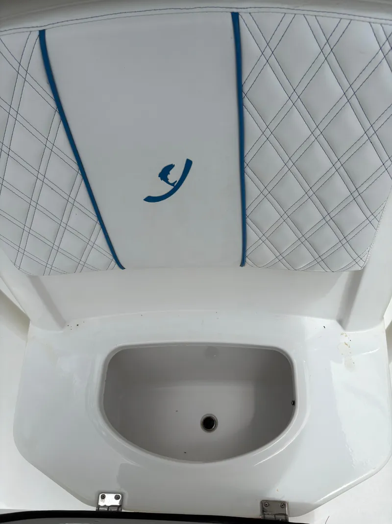 Slide: The Image of White boat seat with blue accents and diamond stitching, Young 27 model, 2019. - 24