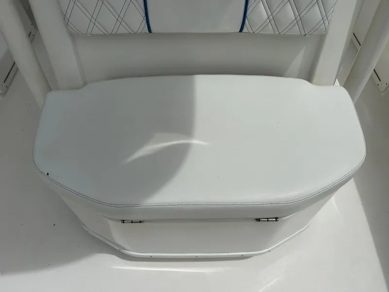 Slide: The Image of White cushioned boat seat with diamond stitching, Young 27 model, 2019. - 33