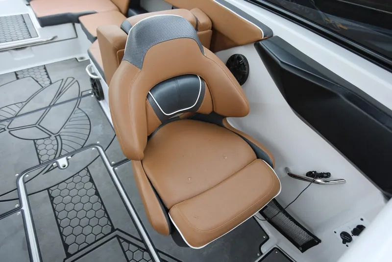 Slide: The Image of 2017 Scarab 255 Impulse boat interior with tan and black seating. - 33