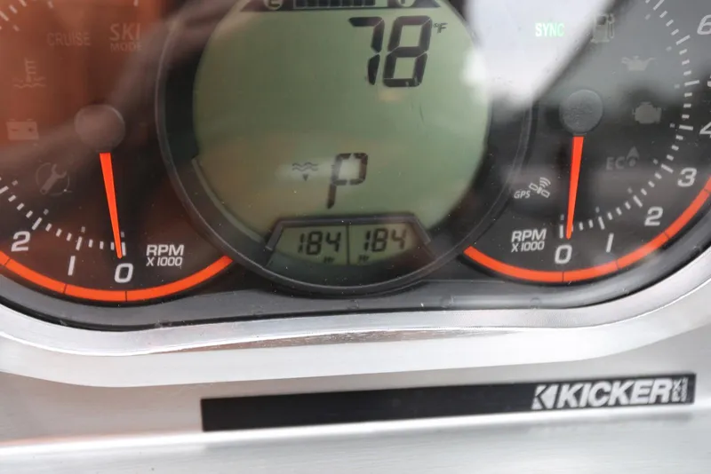 Slide: The Image of Dashboard of a 2017 Scarab 255 Impulse showing 78°F and 184 hours. - 35