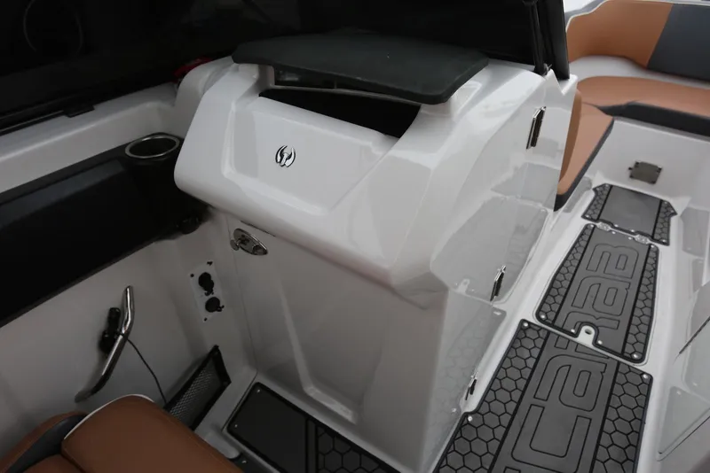 Slide: The Image of 2017 Scarab 255 Impulse boat interior with seating and storage compartments. - 46