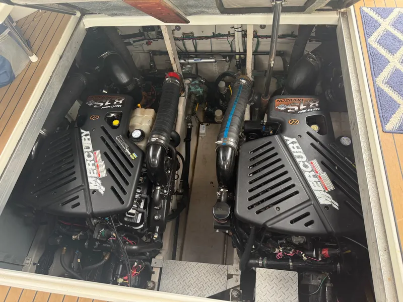 Slide: The Image of Engine compartment of 2003 Sea Ray 380 Sundancer with twin MerCruiser engines. - 30