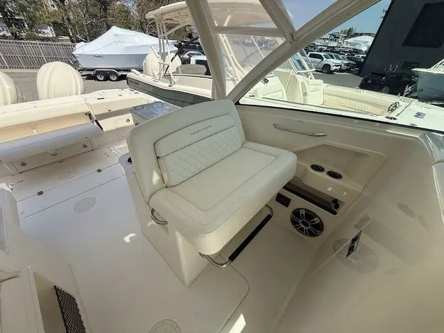Slide: The Image of 2025 Grady-White Freedom 325 boat interior with luxurious seating and modern design. - 13
