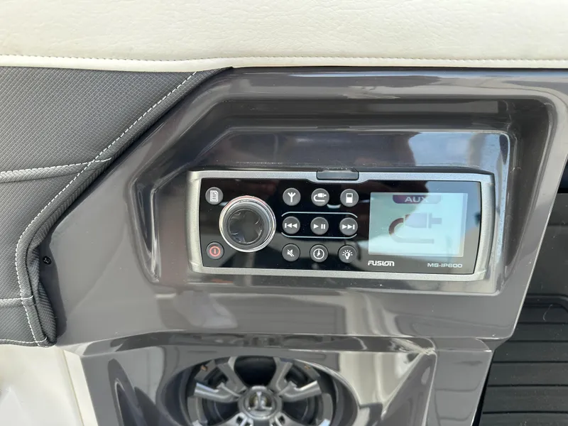 Slide: The Image of Fusion MS-IP600 audio system on 2014 Monterey 268 Super Sport boat dashboard. - 15