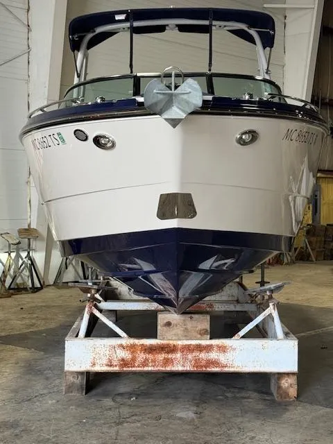 Slide: The Image of 2014 Monterey 268 Super Sport boat on a trailer in a storage facility. - 33