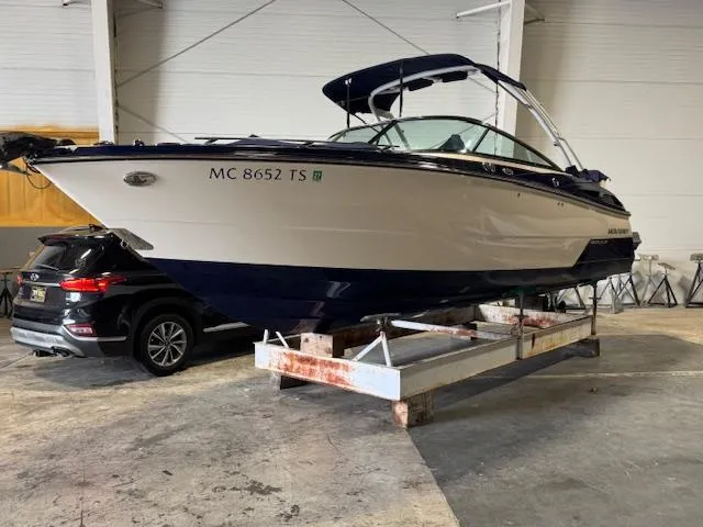 Slide: The Image of 2014 Monterey 268 Super Sport boat in indoor storage on a trailer. - 34