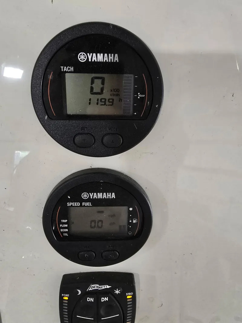 Slide: The Image of Yamaha boat gauges on 2023 Key West 219 FS, displaying tachometer and speed fuel indicators. - 8