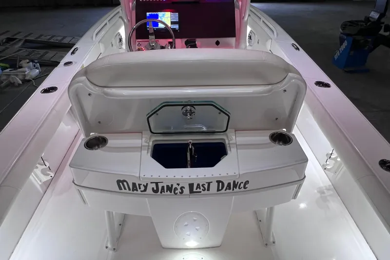 Slide: The Image of 2021 Everglades 253 Center Console boat interior with "Mary Jane's Last Dance" text. - 17